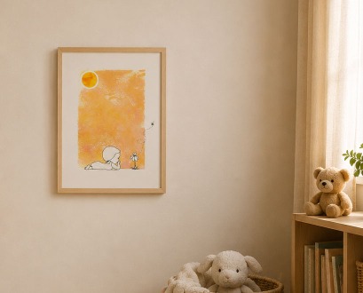 A framed Little Puff print above a shelf with a teddy bear